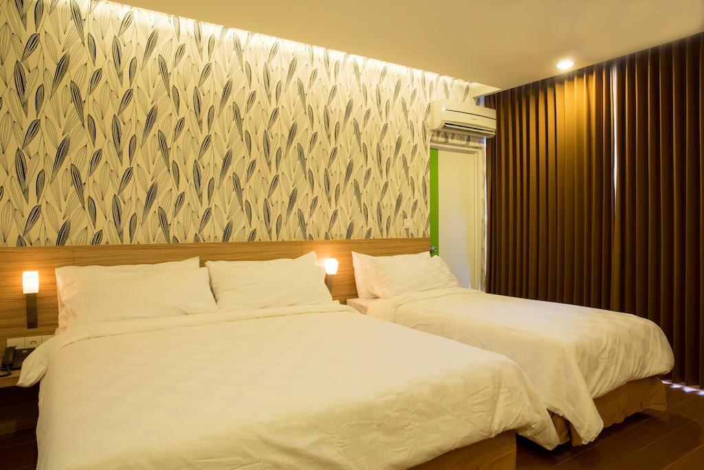 Demira Hotel Surabaja Pokoj fotografie
